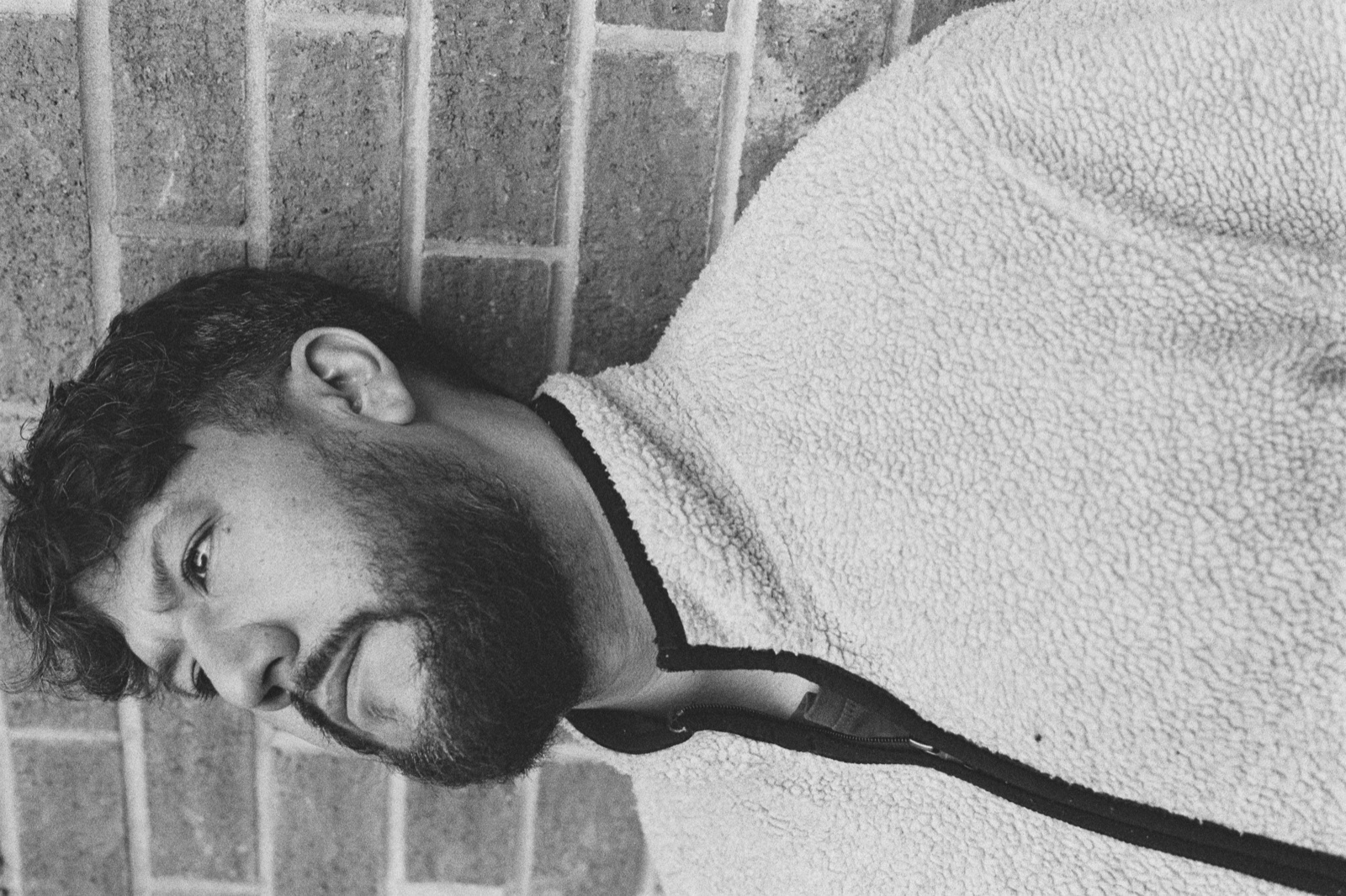 Chris now, black and white 35mm portrait, looking contemplative